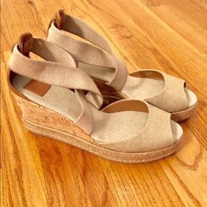 Tory Burch gold wedge shoes